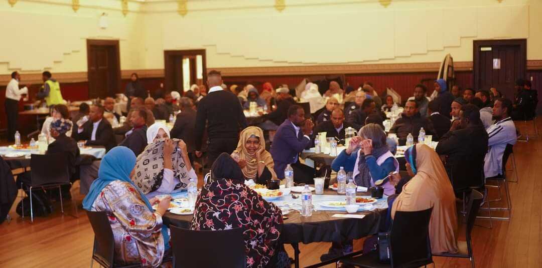 Attendees at Iftar Dinner for Ramadan at Kensington town hall 
